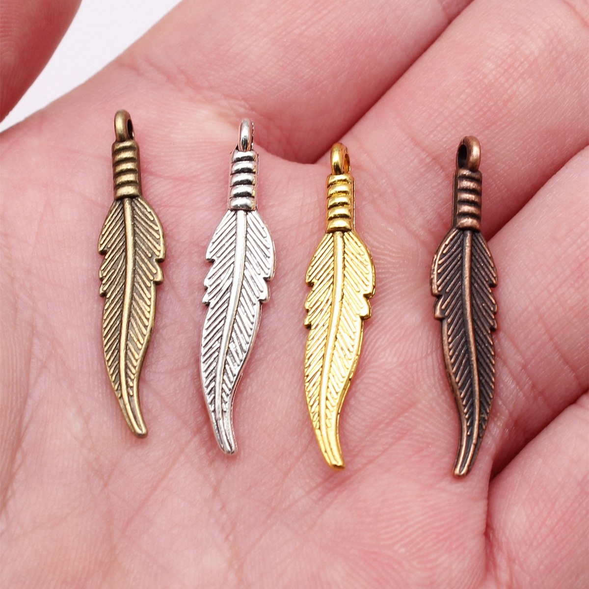 Hollow Feather Charm Leaf Char - Vintage Fashion Tumblr ulasan dan harga